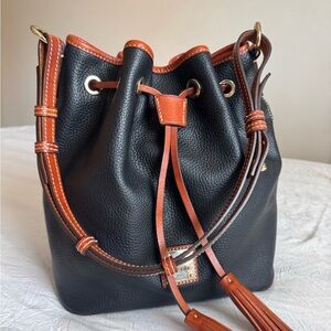 Dooney & Bourke Black and Tan Pebbled Leather Drawstring Shoulder Bag